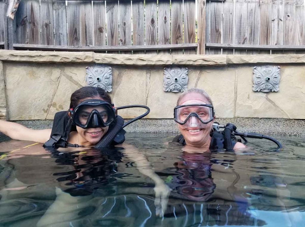 Photo of two students with Ennis Cuba Diving in Ennis Texas surfacing