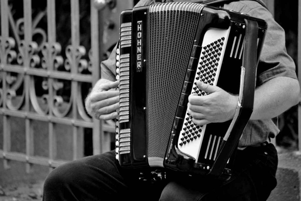 accordion being played by a man