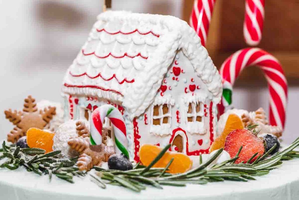 Gingerbread house decorated with ising and candy